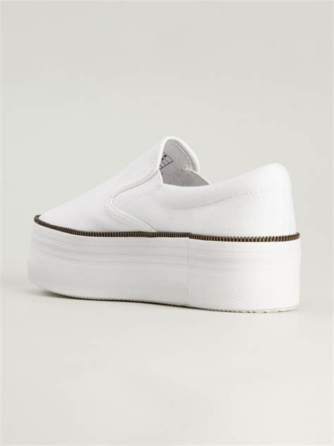 white platform sneakers slip on.